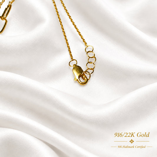 Close-up of adjustable clasp on 916 gold WanZi loop necklace