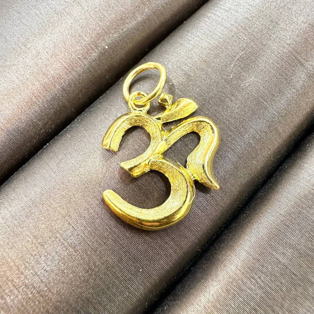 Gold Jewelry and the Significance of the Om Pendant - Best Gold Shop