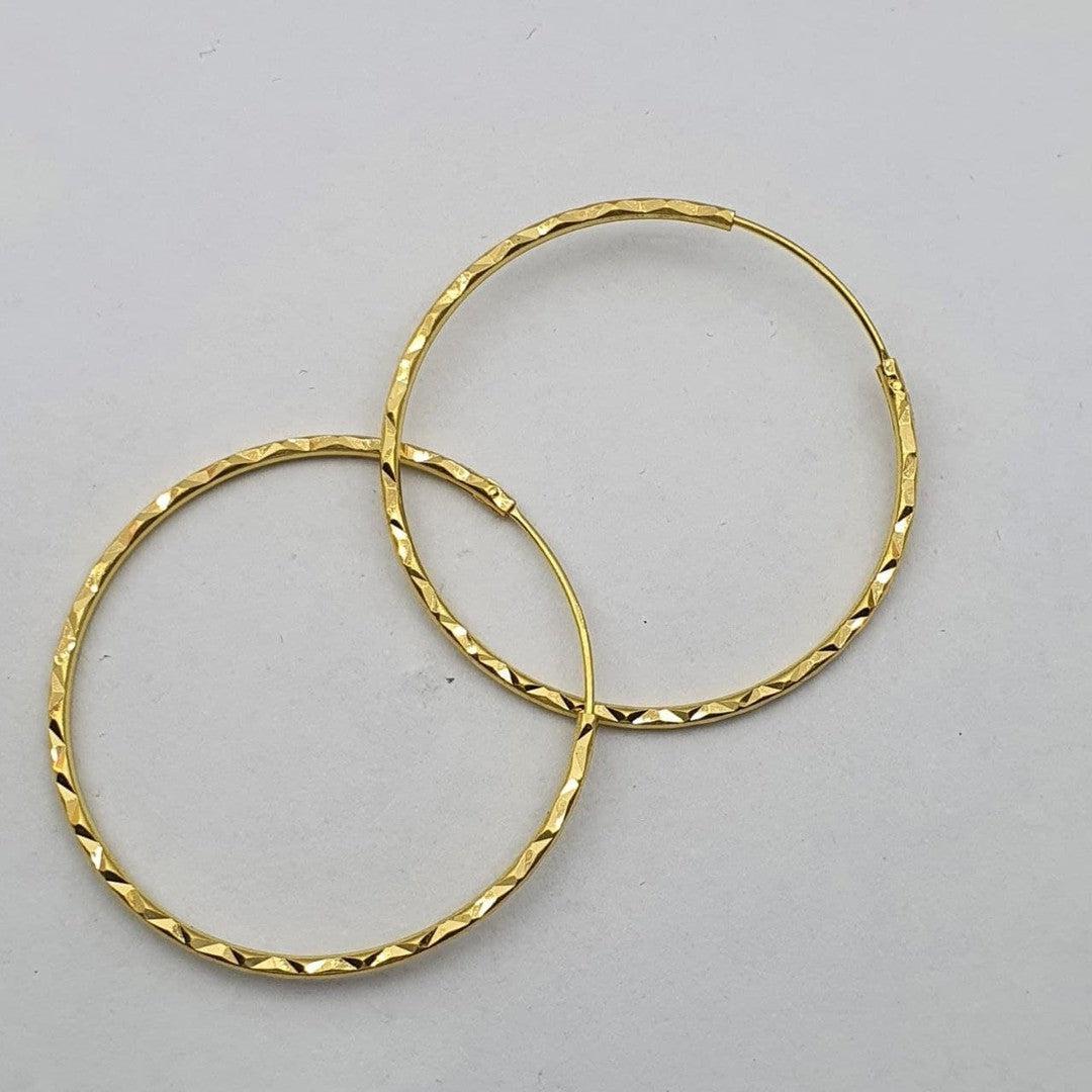 https://bestgoldshop.asia/products/22k-916-gold-cutting-loop-earring-v2<br />
<br />
22k / 916... - Best Gold Shop