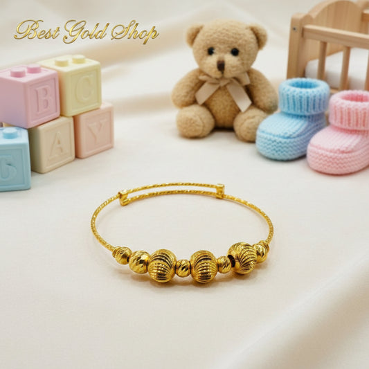 916 gold baby bangle with decorative ball details
