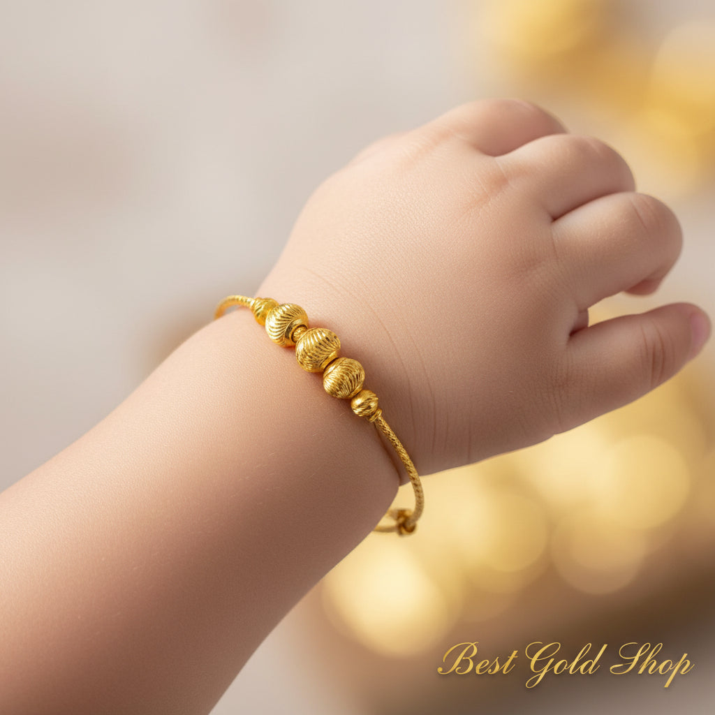 916 gold baby bangle with decorative ball details