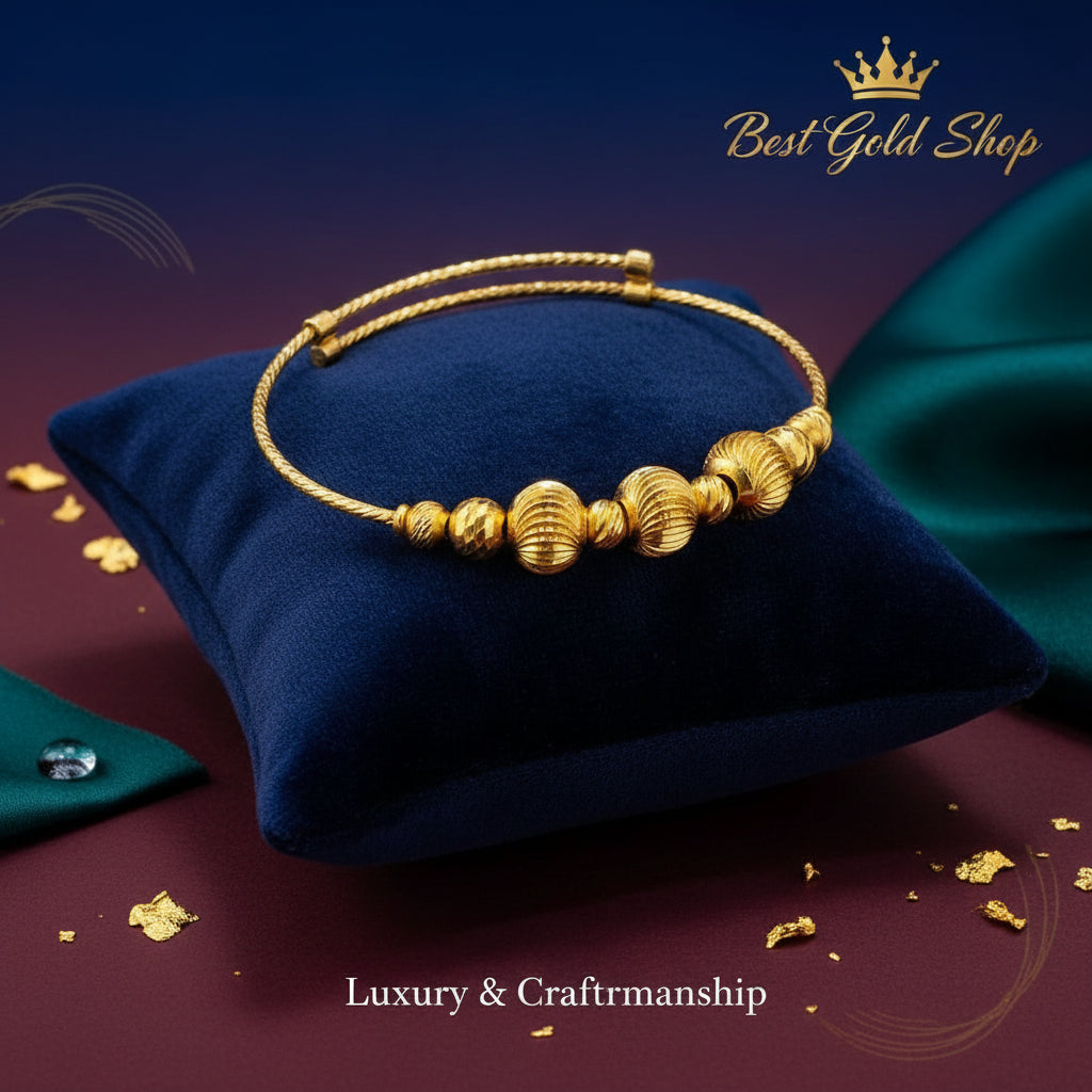 916 gold baby bangle with decorative ball details