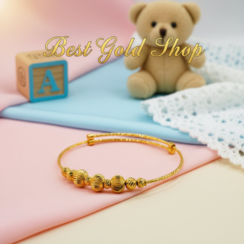 916 gold baby bangle with decorative ball details