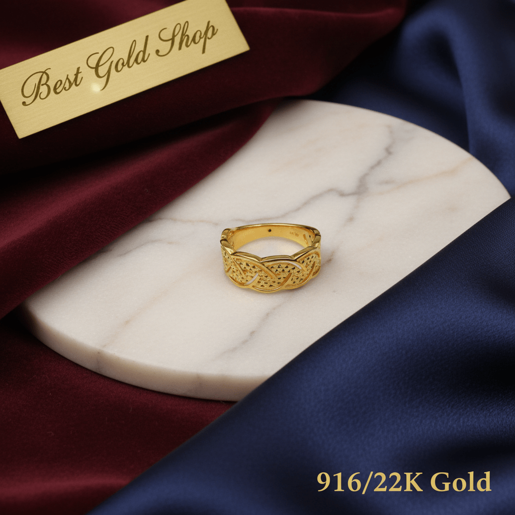 Braided 916 gold lightweight ring displayed on marble and fabric