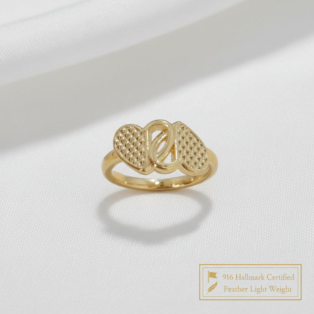 Front view of 916 gold cross heart ring
