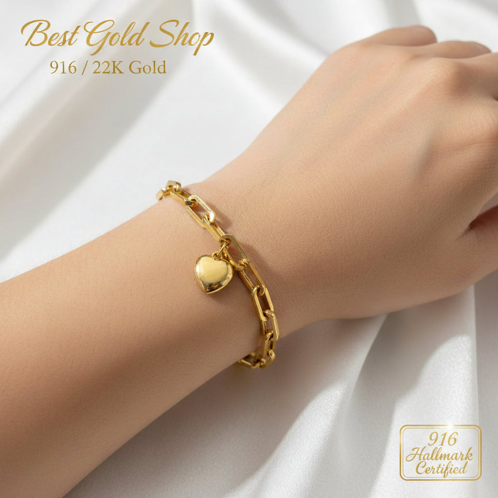 916 gold dangling heart bracelet clasp and link detail