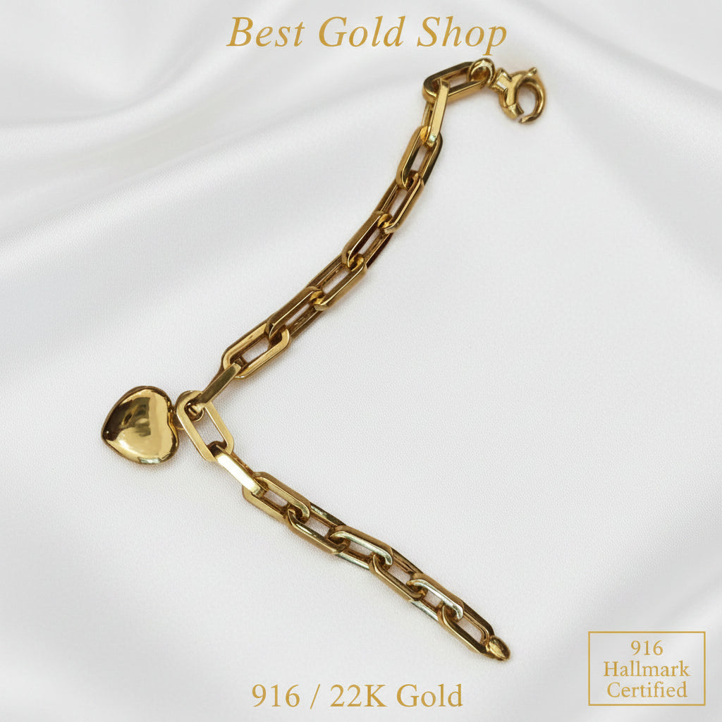 916 gold fancy bracelet with dangling heart charm