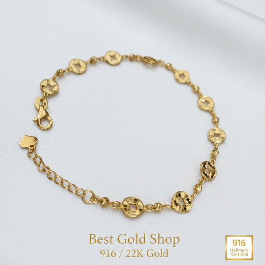 Adjustable 916 gold geometric round motif bracelet angled view