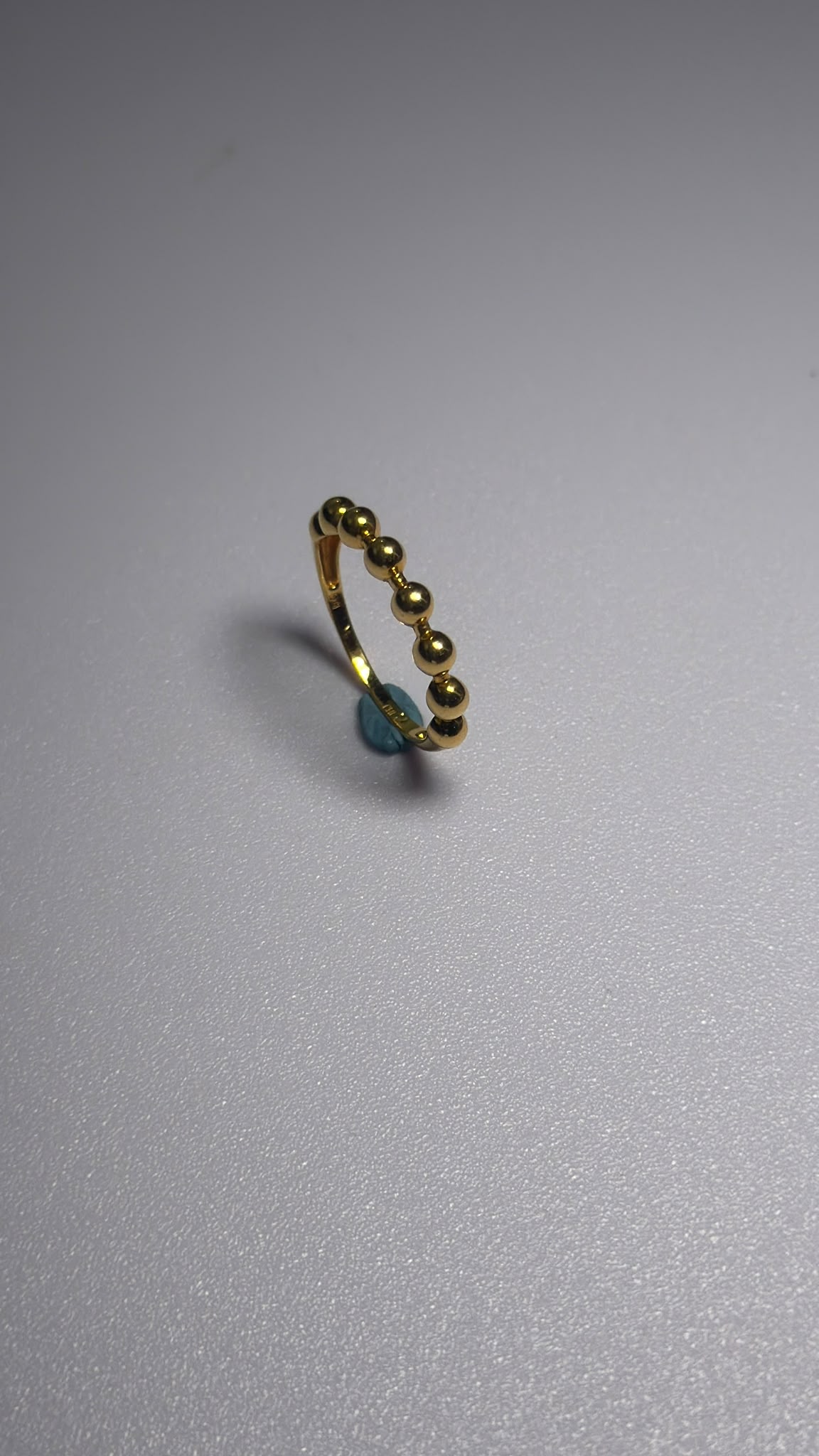 916 gold half-bead ring angled view