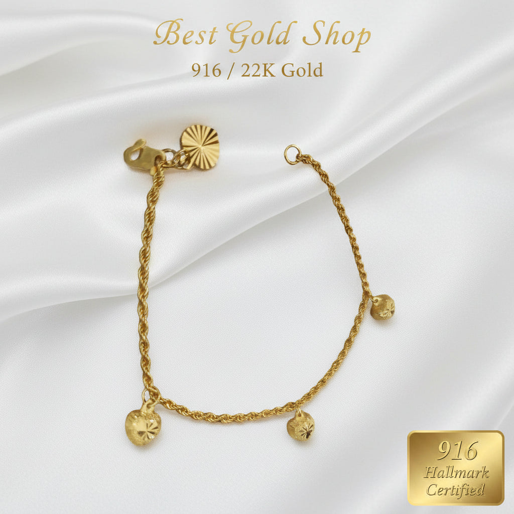 916 Gold hollow rope bracelet with three heart charms full view