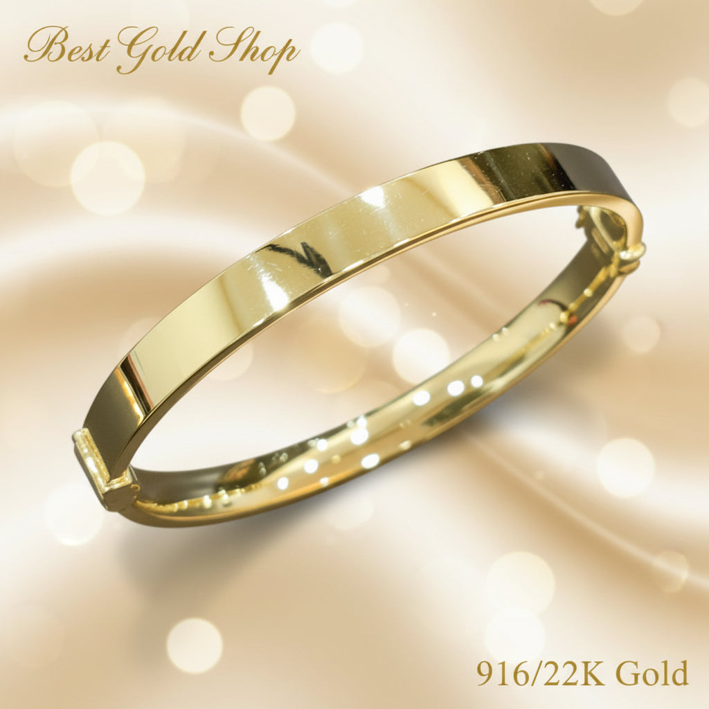Pair view of polished 916 gold hollow shiny bangles