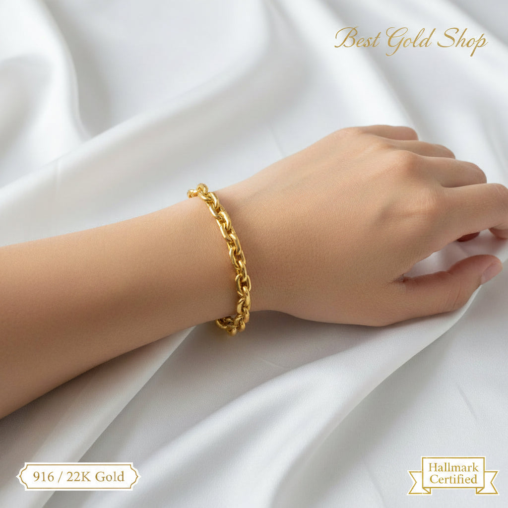 Angled view of heavier 916 gold hollow Wanzi bracelet