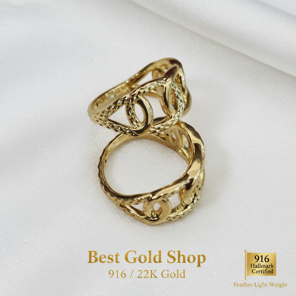 Close-up of polished 916 gold interlock ring pattern