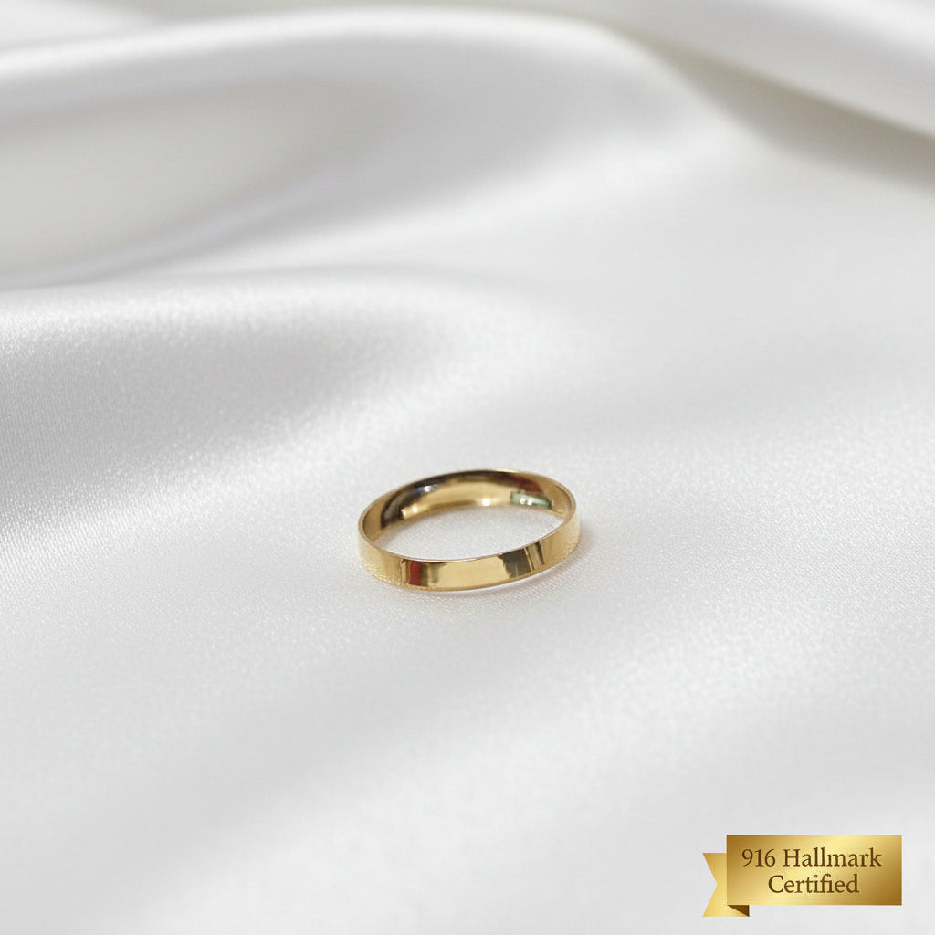 Front view of 916 gold slim plain polished band ring