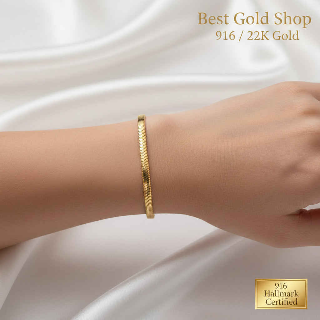 Close-up of 916 gold snake bracelet flexible chain links