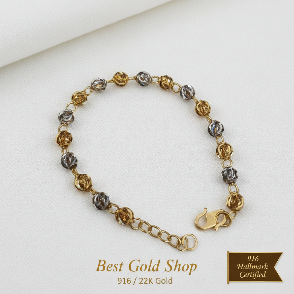 Close-up of clasp on 916 Gold Two-Tone Faceted Ball bracelet.