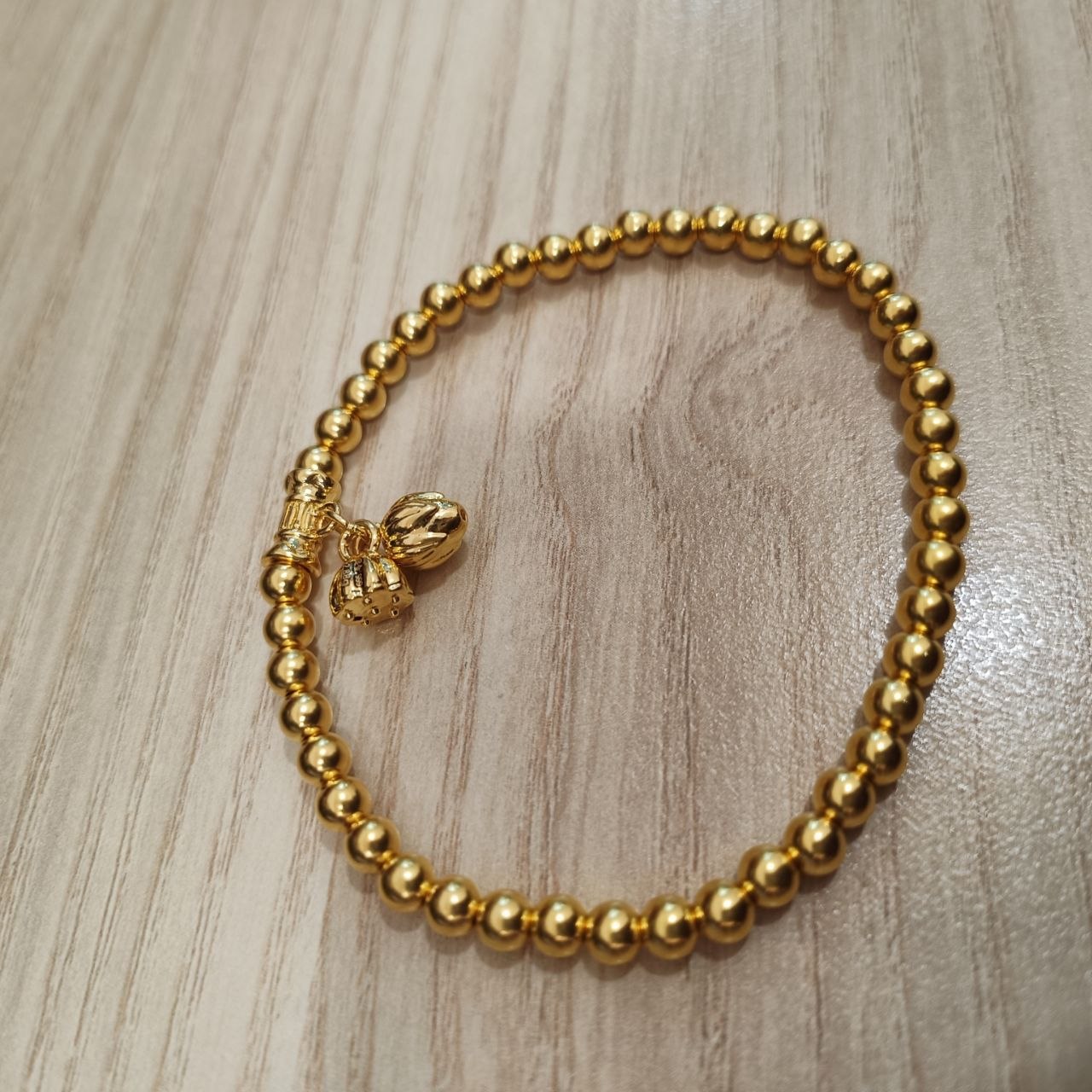 999 gold bead lotus bracelet with polished round beads - alternate view