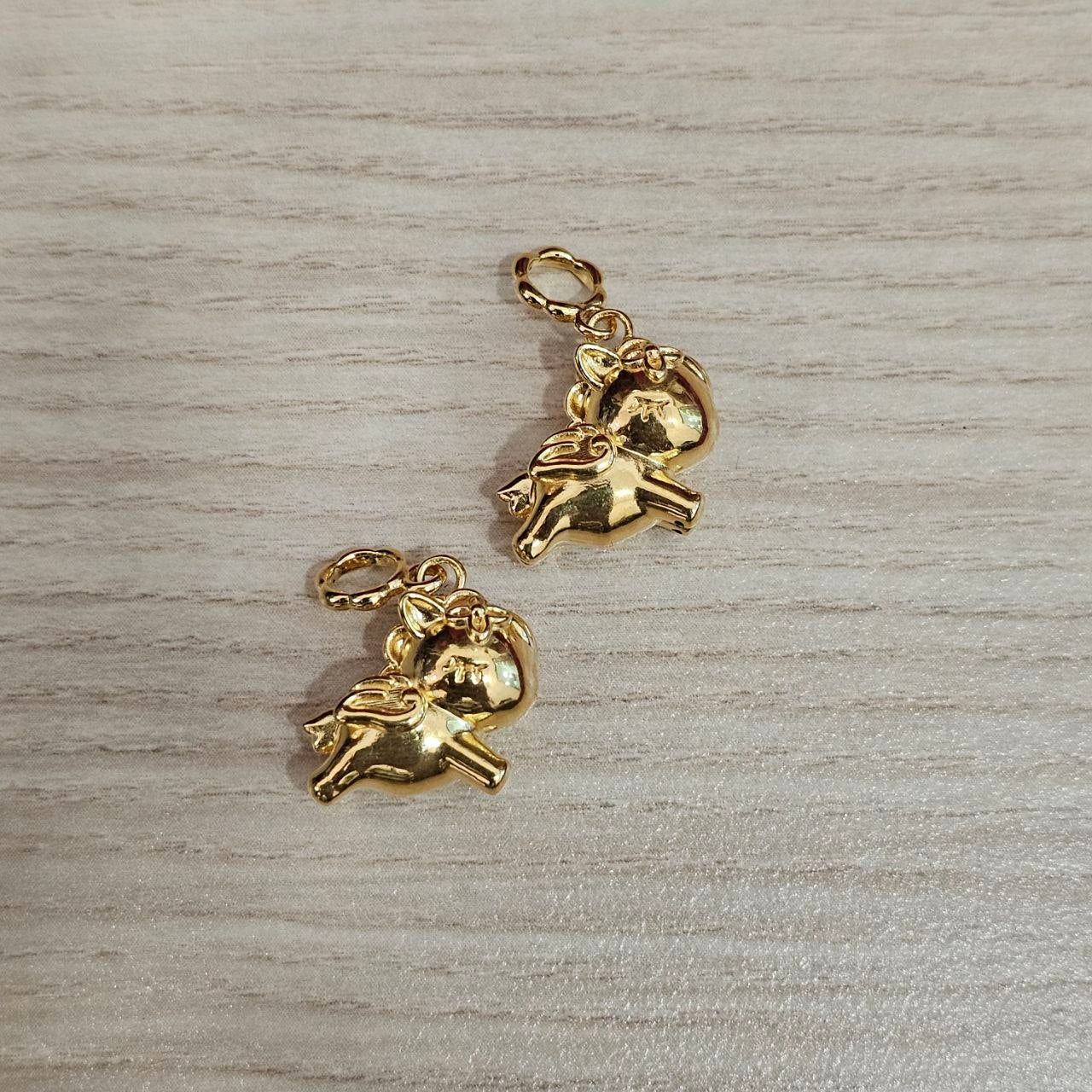 22k / Emas 916 0.26 hingga 0.45 gram Loket dan Azimat Grand