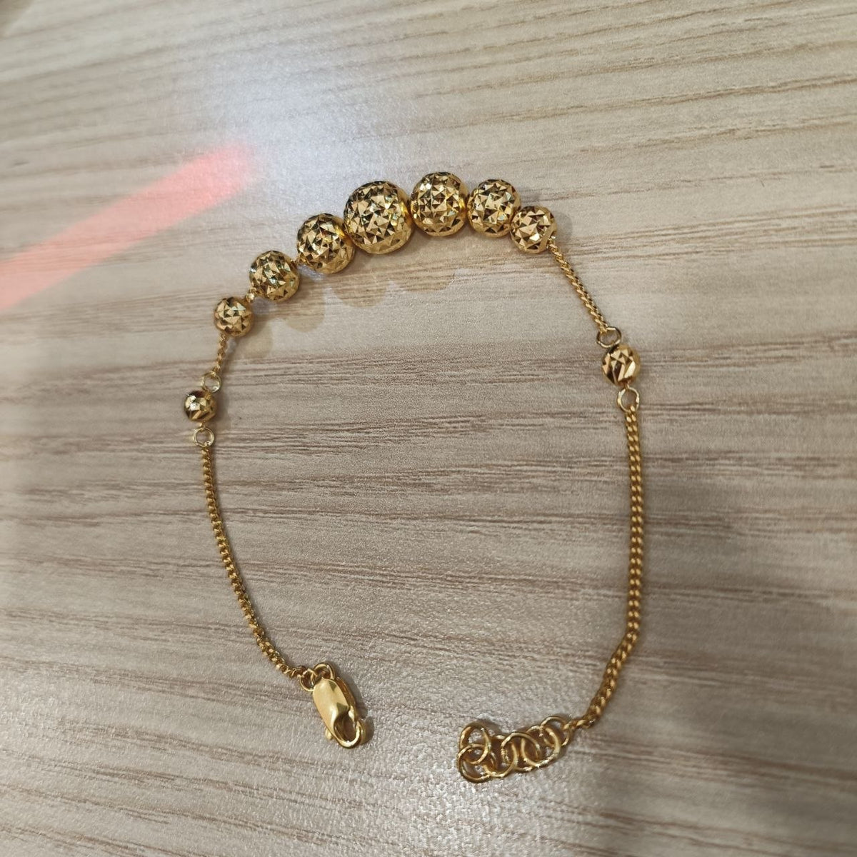916 Gold Graduated Shiny Ball Bracelet | Elegant 22K Design