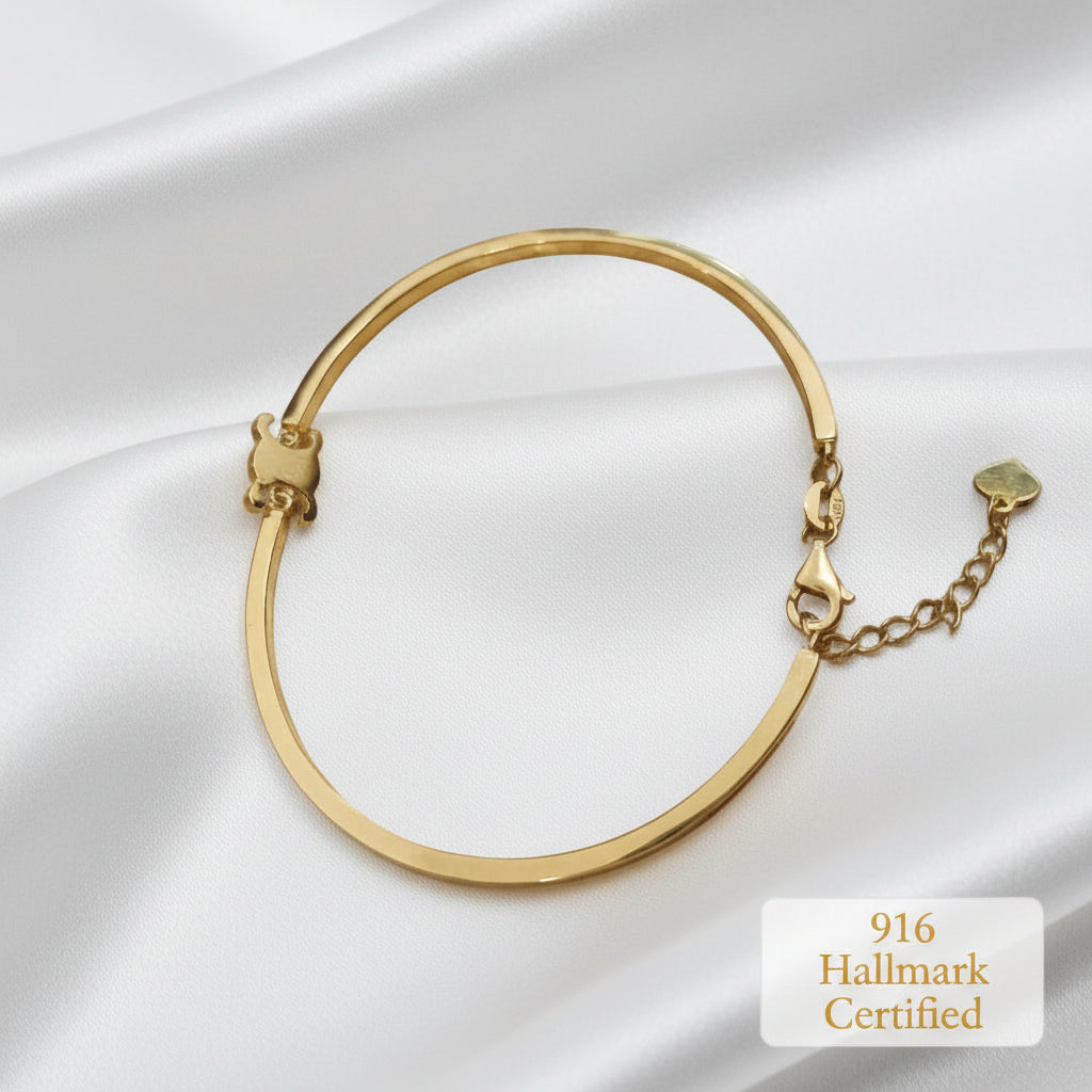 916 gold fancy bangle polished motif detail